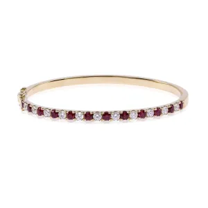 18K YELLOW GOLD RUBY AND DIAMOND BANGLE BRACELET