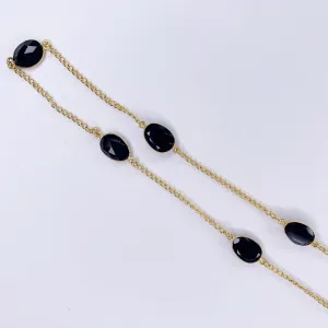 Black Onyx Gold Bezel Glasses Strap