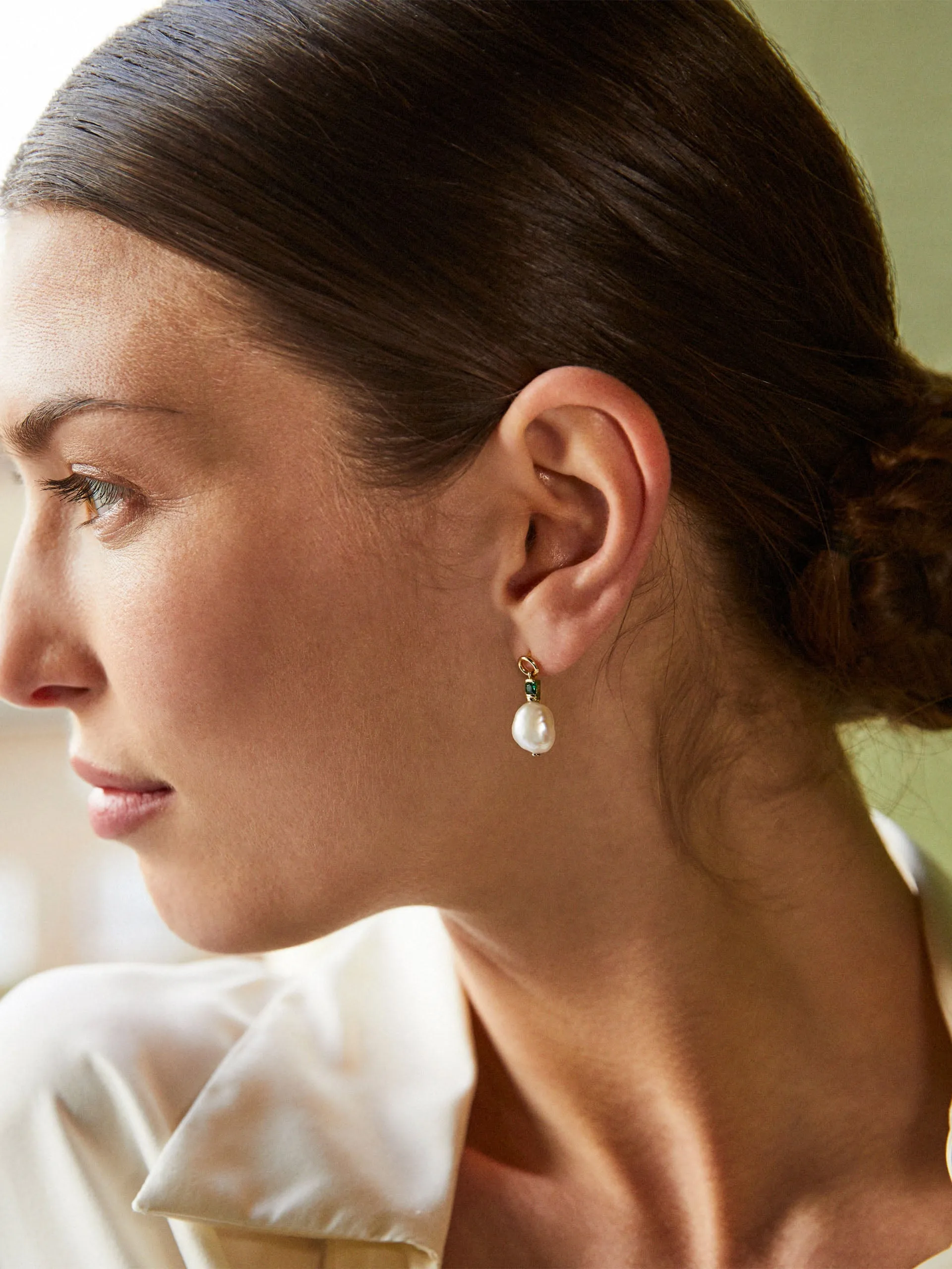 Fleur baroque pearl drop earrings with emerald green stone